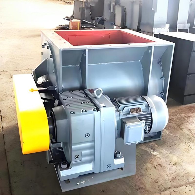 Una máquina industrial de válvula rotativa con alimentador en estrella, caracterizada por una sólida caja metálica diseñada para un rendimiento óptimo.