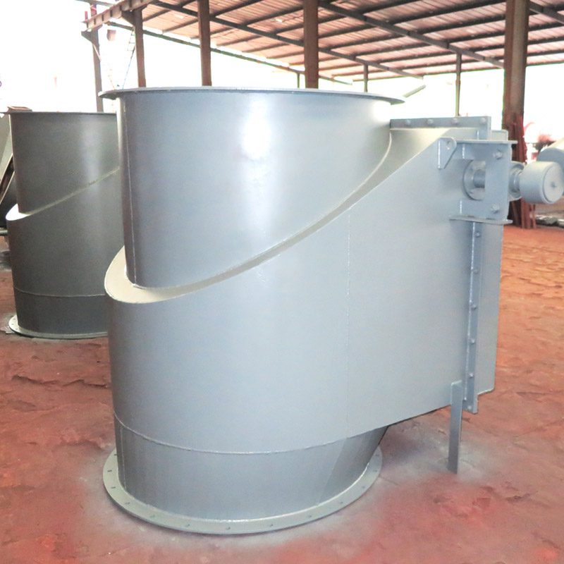A prominent metal pipe within a warehouse, showcasing a heavy hammer lock air flap valve for reliable functionality.
