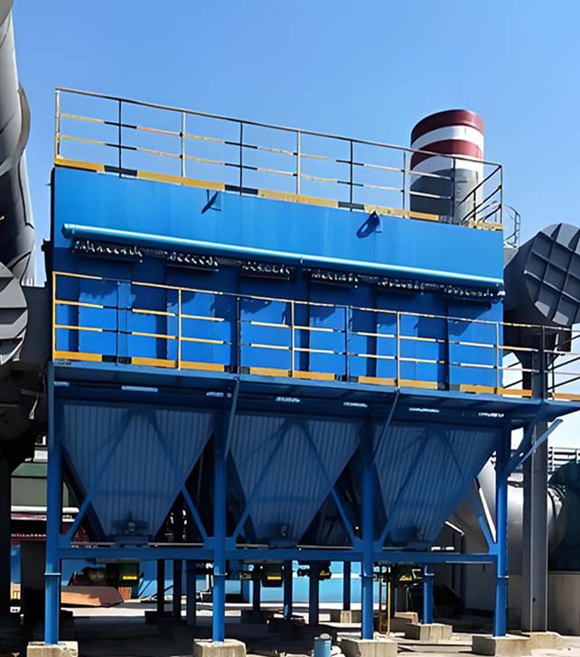 Under the blue sky, a blue bag dust collector is installed outside the factory building